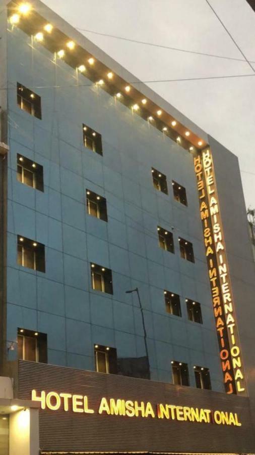 Hotel Amisha International Surate Exterior foto